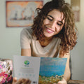Load image into Gallery viewer, Lifestyle image(s) featuring Tree-Free’s Blue Skies and Sunshine card