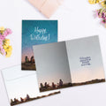 Load image into Gallery viewer, The inside of Tree-Free’s Lakeside Campfire card, with the cover and envelope in the background.