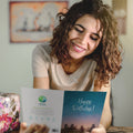 Load image into Gallery viewer, Lifestyle image(s) featuring Tree-Free’s Lakeside Campfire card