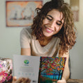 Load image into Gallery viewer, Lifestyle image(s) featuring Tree-Free’s Shimmering Wishes card
