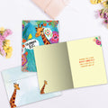 Load image into Gallery viewer, The inside of Tree-Free’s Hello Giraffe card, with the cover and envelope in the background.