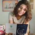 Load image into Gallery viewer, Lifestyle image(s) featuring Tree-Free’s Lights the World card