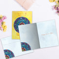 Load image into Gallery viewer, The inside of Tree-Free’s Warmth of Summer card, with the cover and envelope in the background.