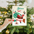 Load image into Gallery viewer, Lifestyle image(s) featuring Tree-Free’s Believe in Magic card