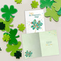 Load image into Gallery viewer, The inside of Tree-Free’s Luck and Cheer card, with the cover and envelope in the background.
