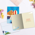 Load image into Gallery viewer, The inside of Tree-Free’s Smooth Sailing 60 card, with the cover and envelope in the background.