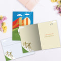 Load image into Gallery viewer, The inside of Tree-Free’s Good Times 40 card, with the cover and envelope in the background.