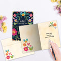 Load image into Gallery viewer, The inside of Tree-Free’s Unseen Places card, with the cover and envelope in the background.