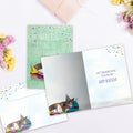 Load image into Gallery viewer, The inside of Tree-Free’s Cat Nap Cupcakes card, with the cover and envelope in the background.