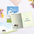 Load image into Gallery viewer, The inside of Tree-Free’s Gate Left Open card, with the cover and envelope in the background.