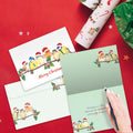Load image into Gallery viewer, The inside of Tree-Free’s Bird Togetherness card, with the cover and envelope in the background.