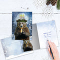 Load image into Gallery viewer, The inside of Tree-Free’s Bear Light card, with the cover and envelope in the background.