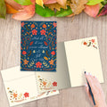 Load image into Gallery viewer, The inside of Tree-Free’s Floral Fall card, with the cover and envelope in the background.