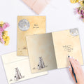 Load image into Gallery viewer, The inside of Tree-Free’s Comforting Bear card, with the cover and envelope in the background.