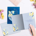 Load image into Gallery viewer, The inside of Tree-Free’s Floral Moonlight card, with the cover and envelope in the background.