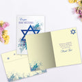 Load image into Gallery viewer, The inside of Tree-Free’s Blue Floral Star card, with the cover and envelope in the background.
