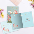 Load image into Gallery viewer, The inside of Tree-Free’s Magical Floral Unicorn Daughter card, with the cover and envelope in the background.