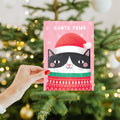 Load image into Gallery viewer, Lifestyle image(s) featuring Tree-Free’s Santa Paws card