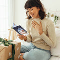 Load image into Gallery viewer, Lifestyle image(s) featuring Tree-Free’s Sweet Snowglobe card