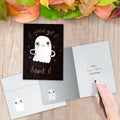 Load image into Gallery viewer, The inside of Tree-Free’s Haunt It card, with the cover and envelope in the background.