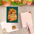 Load image into Gallery viewer, The inside of Tree-Free’s Overflowing Gratitude card, with the cover and envelope in the background.