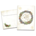 Load image into Gallery viewer, The cover of Tree-Free's Winter Pine Wreath card, along with its matching envelope.