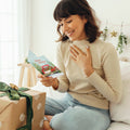 Load image into Gallery viewer, Lifestyle image(s) featuring Tree-Free’s Kringle Tree Farm card