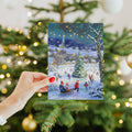 Load image into Gallery viewer, Lifestyle image(s) featuring Tree-Free’s Dreaming of a White Christmas card