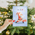 Load image into Gallery viewer, Lifestyle image(s) featuring Tree-Free’s Ho Ho Ohm card