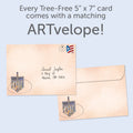 Load image into Gallery viewer, The envelope for Tree-Free’s Beautiful Dreidel card, along with the following text: “Every Tree-Free 5x7 card comes with a matching ARTvelope!”