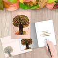 Load image into Gallery viewer, The inside of Tree-Free’s Abundant Thanksgiving card, with the cover and envelope in the background.
