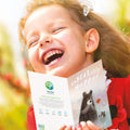 Load image into Gallery viewer, Lifestyle image(s) featuring Tree-Free’s Unbearably Happy card