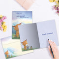 Load image into Gallery viewer, The inside of Tree-Free’s Lucky Journey card, with the cover and envelope in the background.