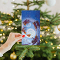 Load image into Gallery viewer, Lifestyle image(s) featuring Tree-Free's Soaring Santa card