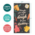 Load image into Gallery viewer, The cover of Tree-Free’s Might Knead Dough card with lines demonstrating its 5x7 dimensions, along with the following text: “100% PCW recycled paper, proudly made in the USA, sustainably printed on extra-thick card stock”