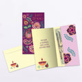 Load image into Gallery viewer, The inside of Tree-Free’s Floral Candles card, with the cover and envelope in the background.