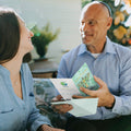 Load image into Gallery viewer, Lifestyle image(s) featuring Tree-Free’s Floral Menorah card