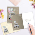 Load image into Gallery viewer, The inside of Tree-Free’s Just Married card, with the cover and envelope in the background.