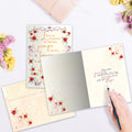 Load image into Gallery viewer, The inside of Tree-Free’s Love and Hope card, with the cover and envelope in the background.