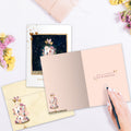 Load image into Gallery viewer, The inside of Tree-Free’s Love and Happiness card, with the cover and envelope in the background.