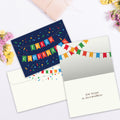 Load image into Gallery viewer, The inside of Tree-Free’s Cumpleanos Confetti card, with the cover and envelope in the background.
