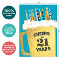 Load image into Gallery viewer, The cover of Tree-Free’s Cheers to 21 card with lines demonstrating its 5x7 dimensions, along with the following text: “100% PCW recycled paper, proudly made in the USA, sustainably printed on extra-thick card stock”
