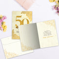 Load image into Gallery viewer, The inside of Tree-Free’s 50 Golden Years card, with the cover and envelope in the background.
