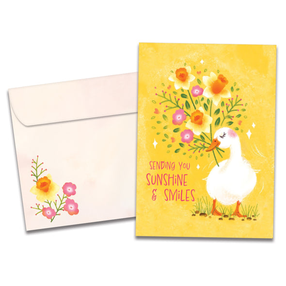 The cover of Tree-Free's Sunshine and Smiles card, along with its matching envelope.