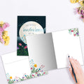 Load image into Gallery viewer, The inside of Tree-Free’s Boundless Love card, with the cover and envelope in the background.
