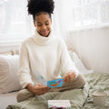 Load image into Gallery viewer, Lifestyle image(s) featuring Tree-Free’s Feel Better Tea card
