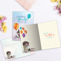Load image into Gallery viewer, The inside of Tree-Free’s Still Looking Sharp card, with the cover and envelope in the background.
