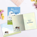 Load image into Gallery viewer, The inside of Tree-Free’s Gate Left Open card, with the cover and envelope in the background.
