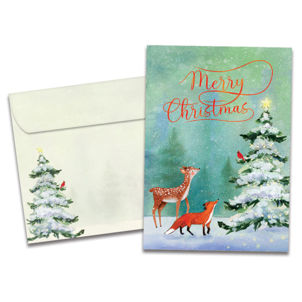 The cover of Tree-Free's Winter Joy card, along with its matching envelope.