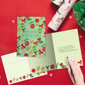 Load image into Gallery viewer, The inside of Tree-Free’s Fiestas Pattern card, with the cover and envelope in the background.

